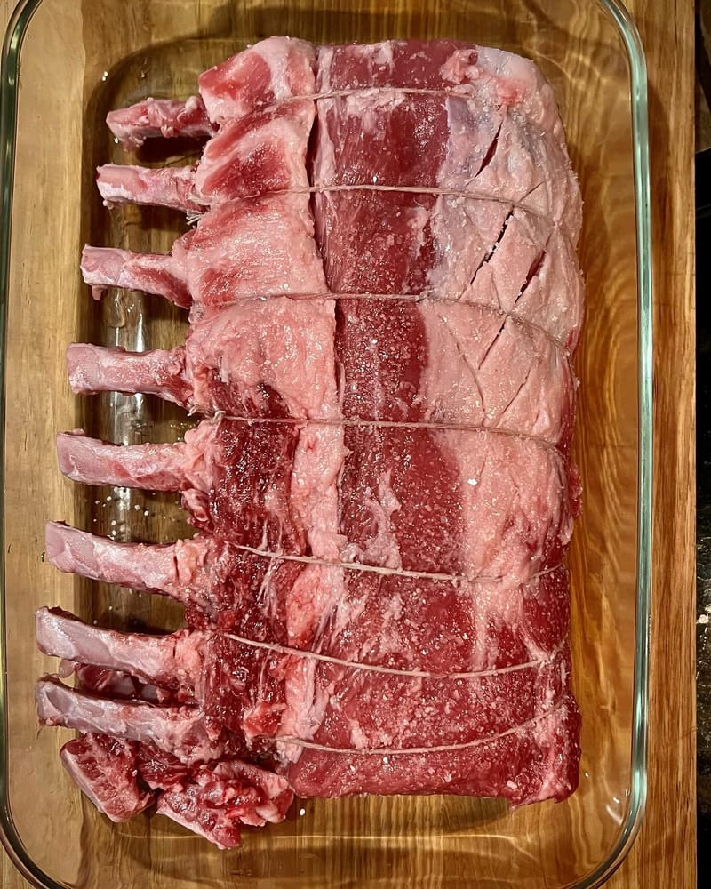 Frenched, trimmed, scored, twined, and brined. Ready for a good night sleep before the big day tomorrow. #pork #christmas…