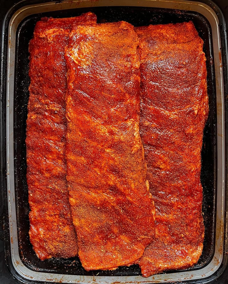I’m really liking Fire & Smoke Society’s Sweet Preacher rub. Slathered these ribbees with some sriracha and then a healthy…