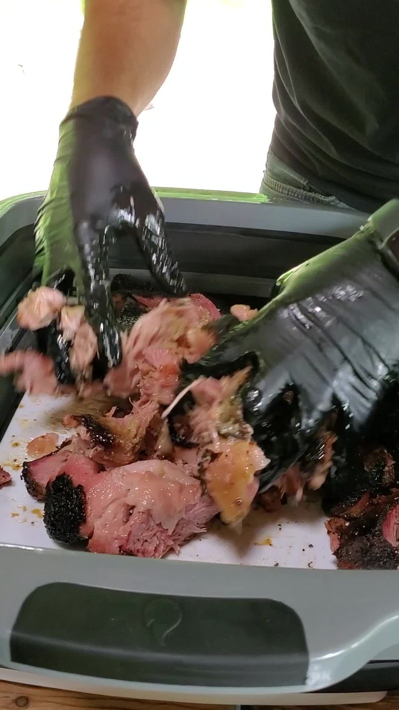 Pull your pork butt with your hands! So satisfying #bbq #bbqtips #smokedmeat #pulledpork #howto #barbeque
