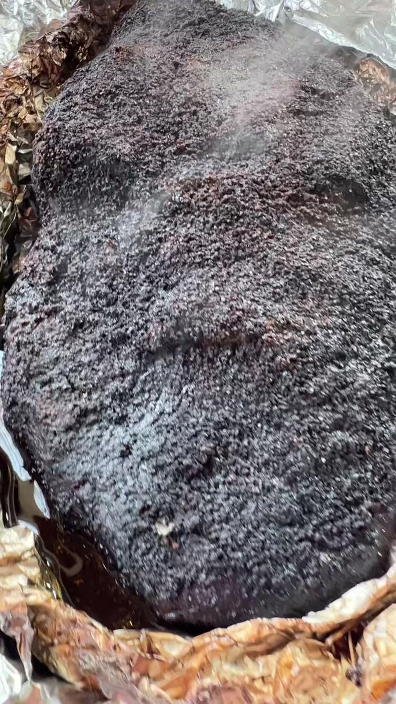 Brisket right after unwrapping. That steam and bark. It was delicious! Foil boat on this one. Music by @Cesar0787 check out…