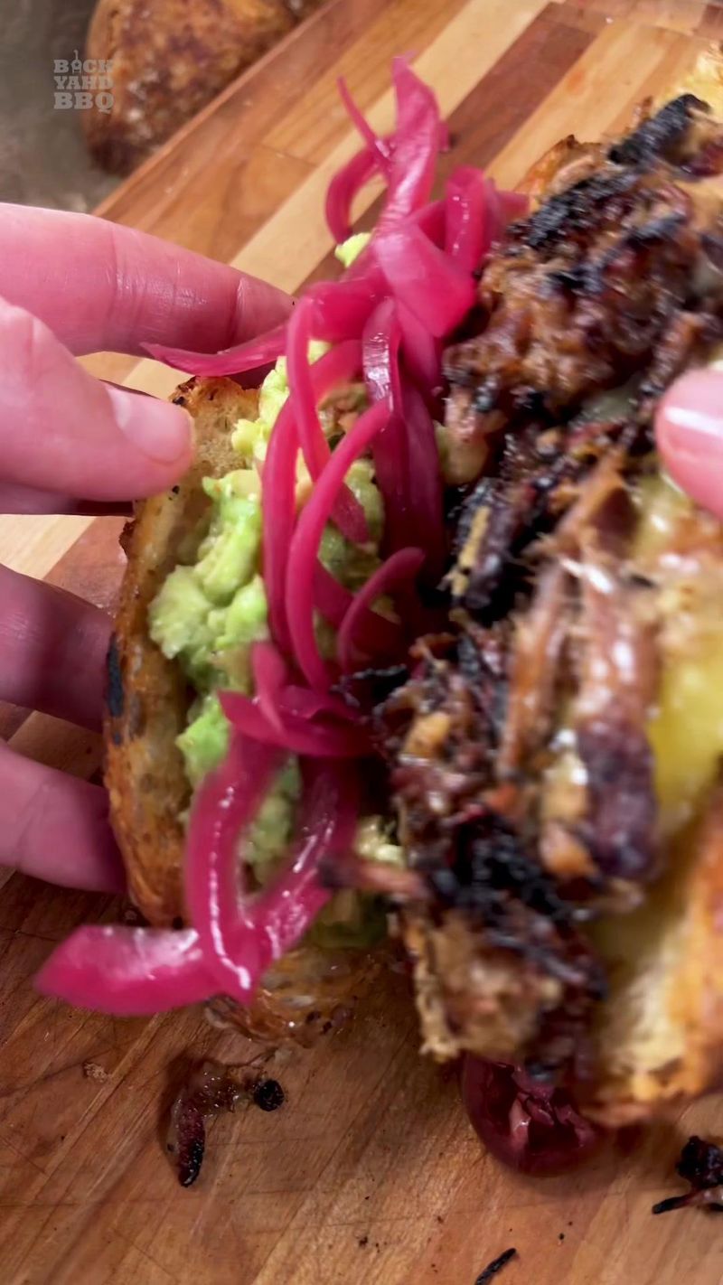 A quick pulled pork avocado pickled red onion cheese on homemade bread sandwich. Music by @Rock Choi masterful guitar work.…