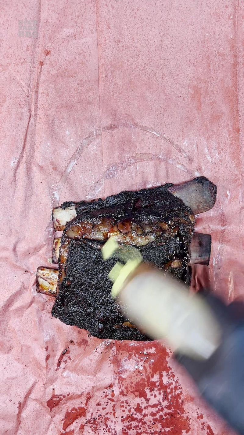 When smoking a brisket, we save the trimmings and render them down into tallow while smoking it. But with beef ribs, we…