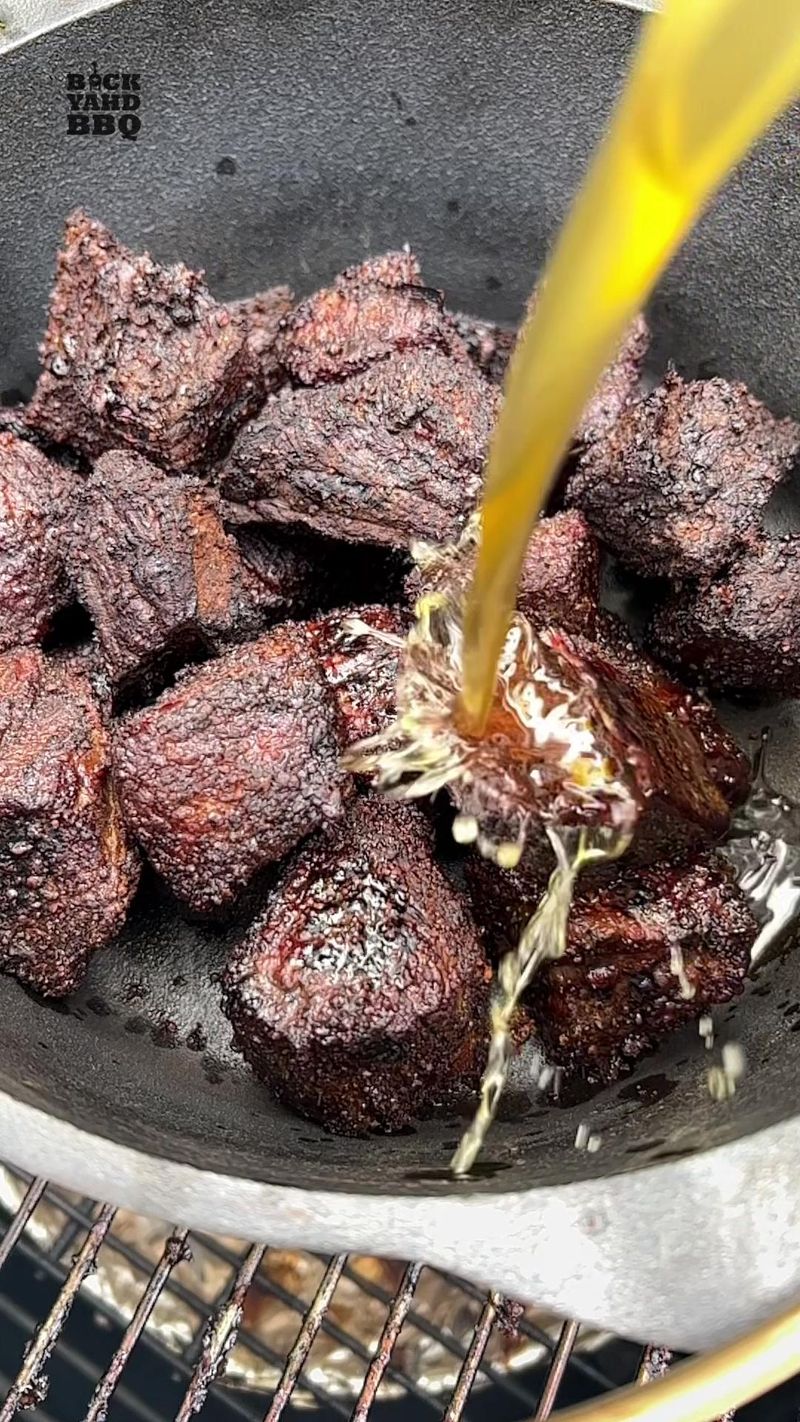 Burnt ends are nice and dark. Time to give them a warm bath in their own fat, aka confit. #bbq #brisket #burntends