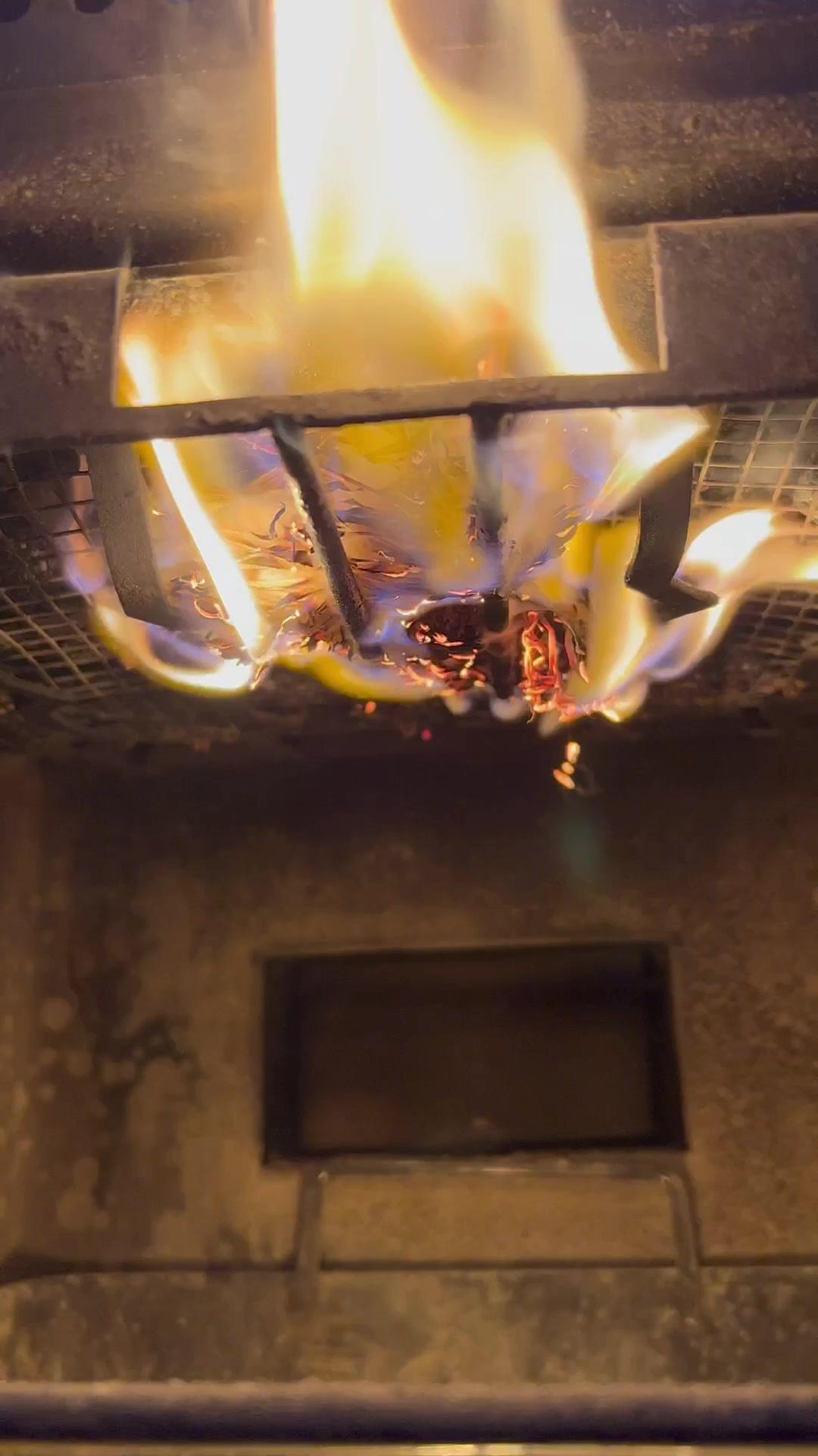 Lighting the @masterbuilt gravity fed with @royaloakcharcoal tumbleweeds. #smoker #fire #chill